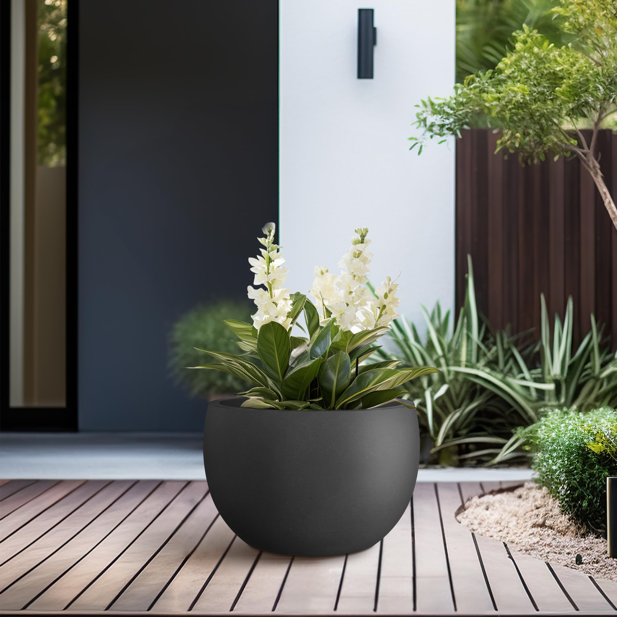 Close-up of Kante Small Round Black Concrete Planter's surface finish
