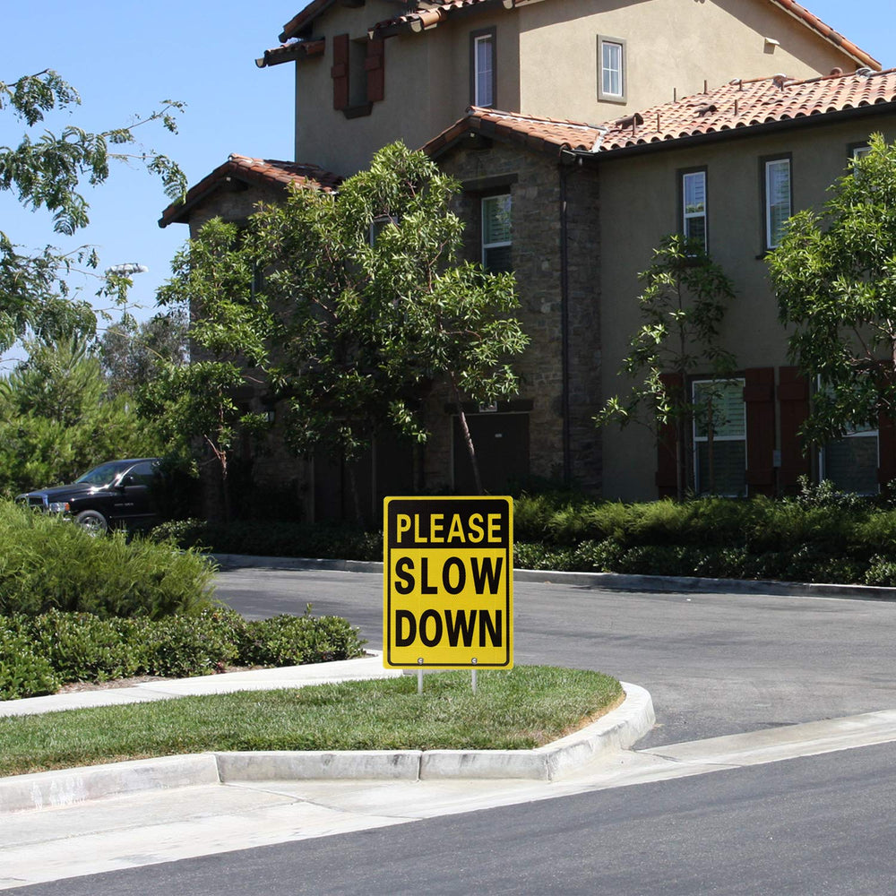 Close-up of Kichwit Slow Down Sign pre-drilled holes