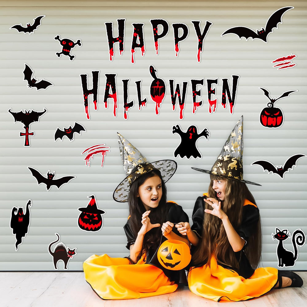 Close-up of kockuu Halloween magnets with pumpkin and cat designs