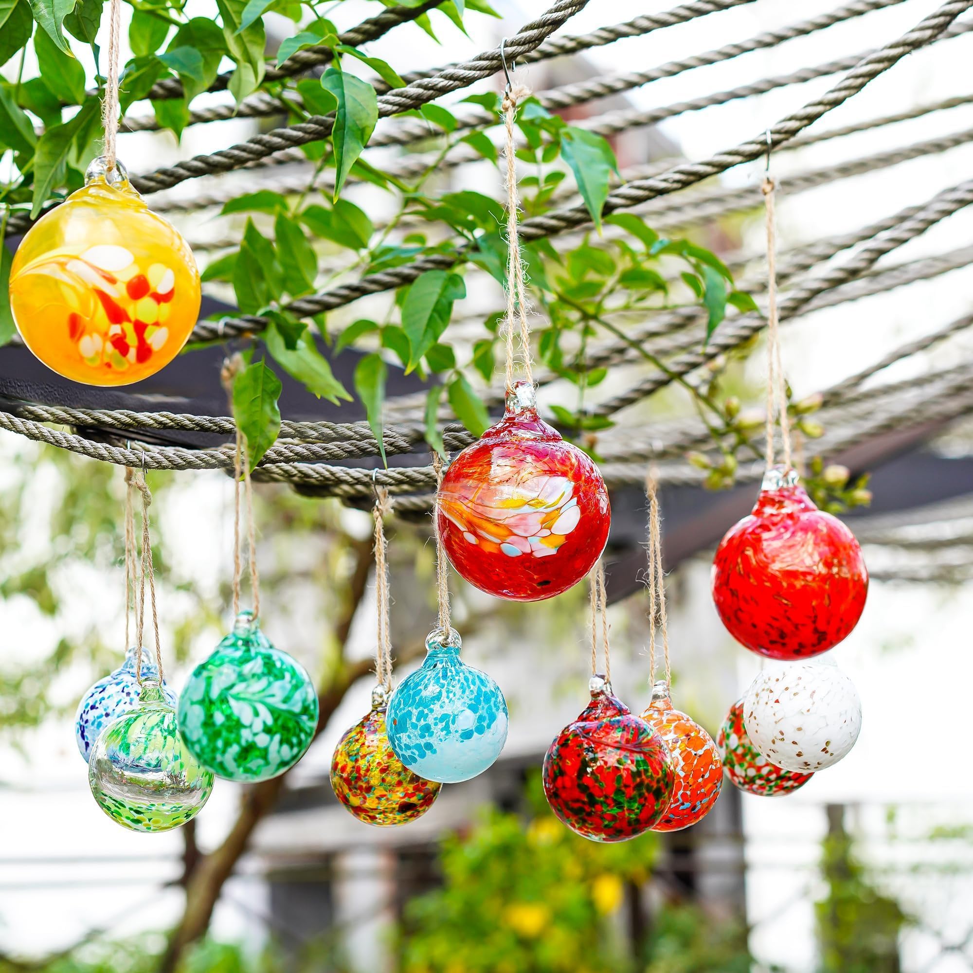 Close-up of KRISININE glass ball ornament with intricate details