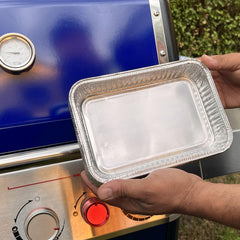 Close-up of Matchwaves disposable aluminum grease tray