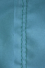 Close-up of Mini Lustrous Grill Cover material and stitching