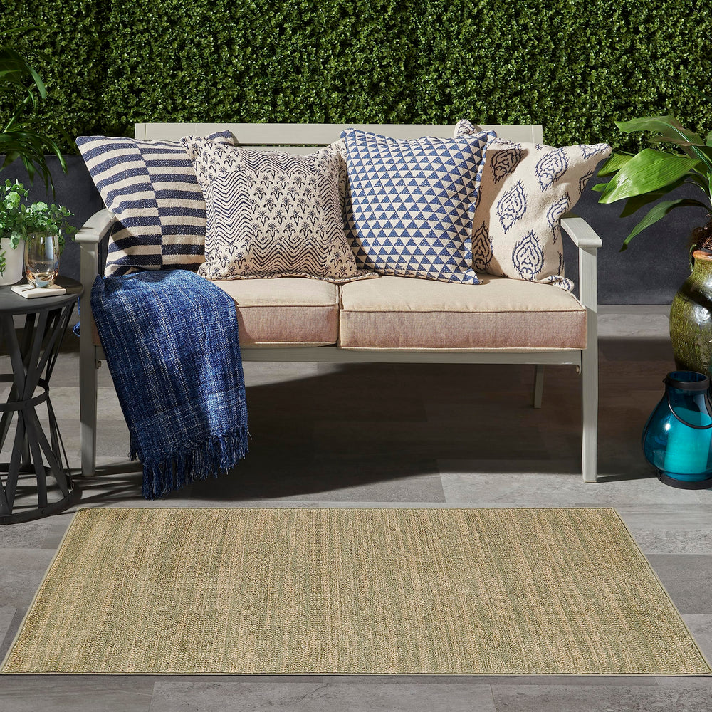 Close-up of Nourison Essentials Green Gold rug texture