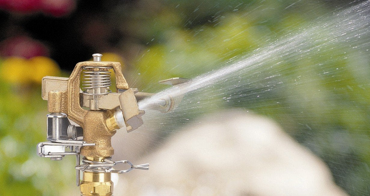 Close-up of Orbit 1/2" connection on brass sprinkler head
