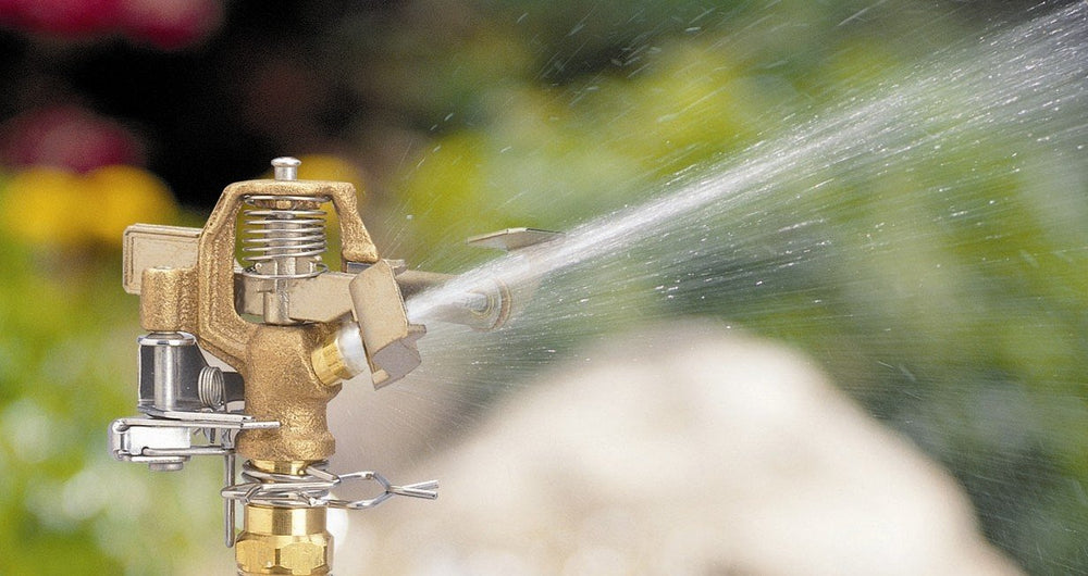 Close-up of Orbit 1/2" connection on brass sprinkler head