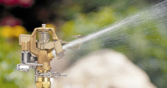 Close-up of Orbit 1/2" connection on brass sprinkler head
