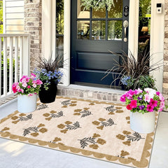 Close-up of Othilic Floral Entry Rug's scalloped edge
