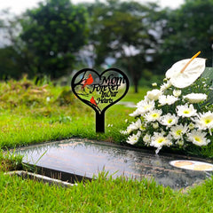 Close-up of OZIO Heart Memorial Grave Marker showing the word 'Mom'
