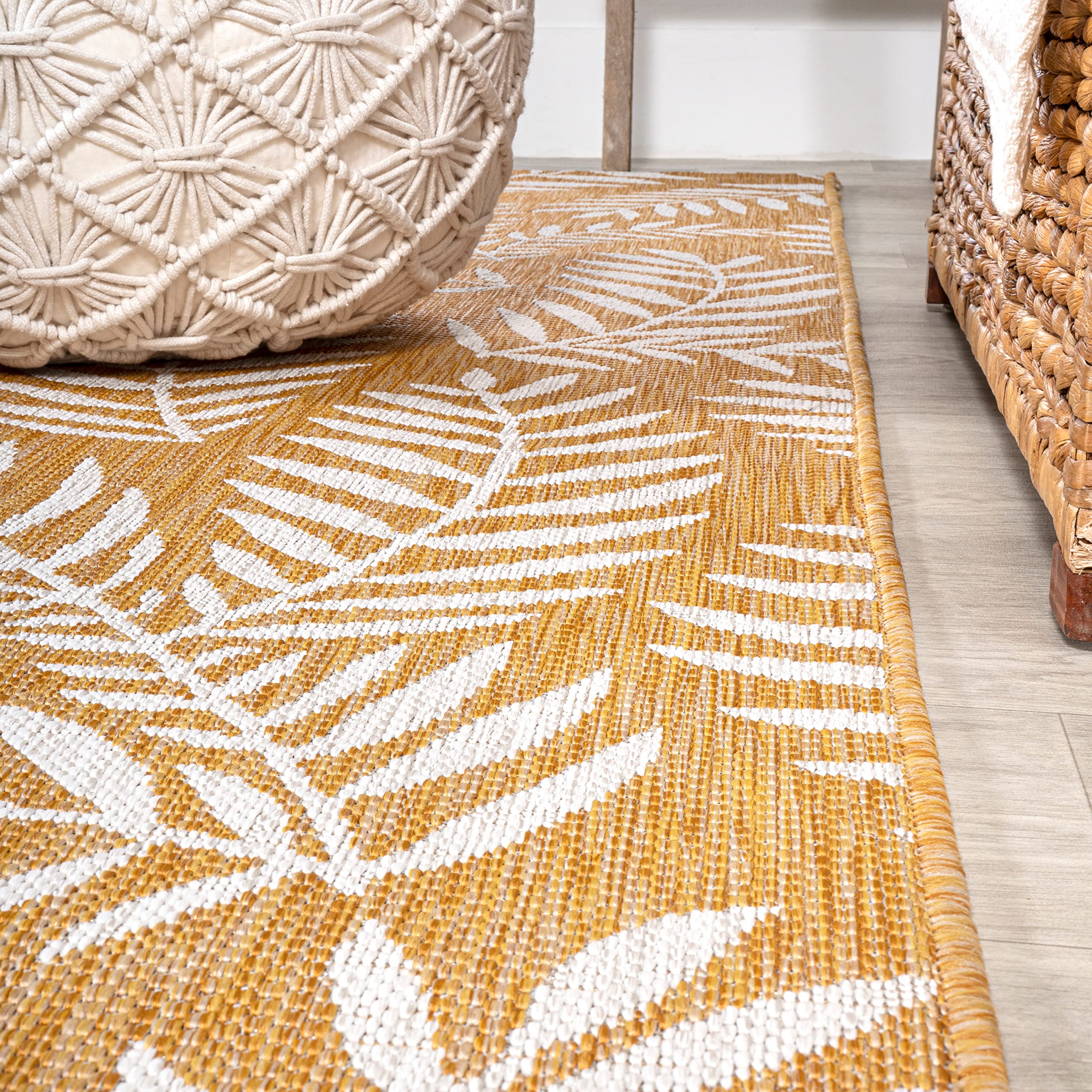 Close-up of palm frond design on JONATHAN Y Runner Rug