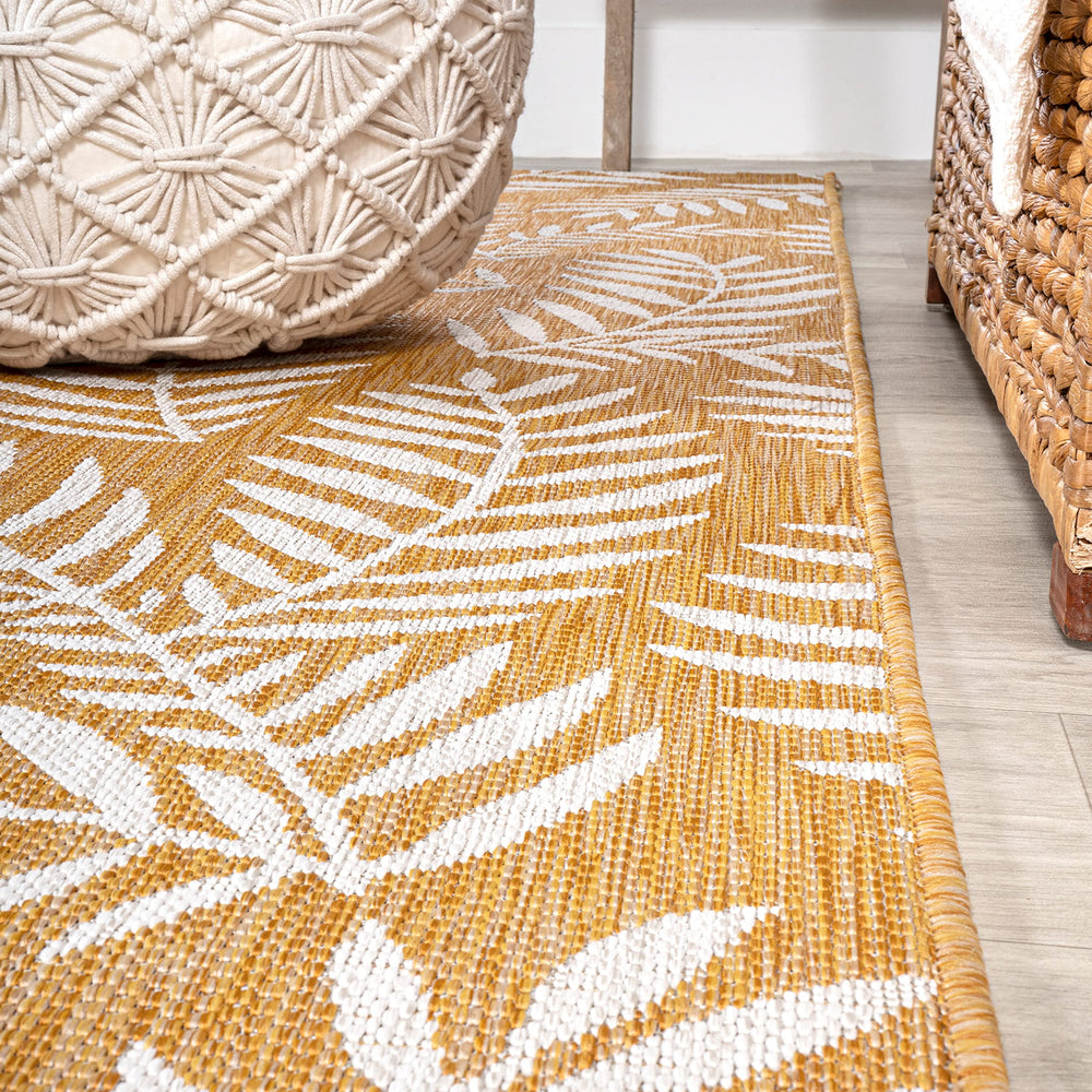 Close-up of palm frond design on JONATHAN Y Runner Rug