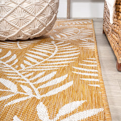 Close-up of palm frond design on JONATHAN Y Runner Rug