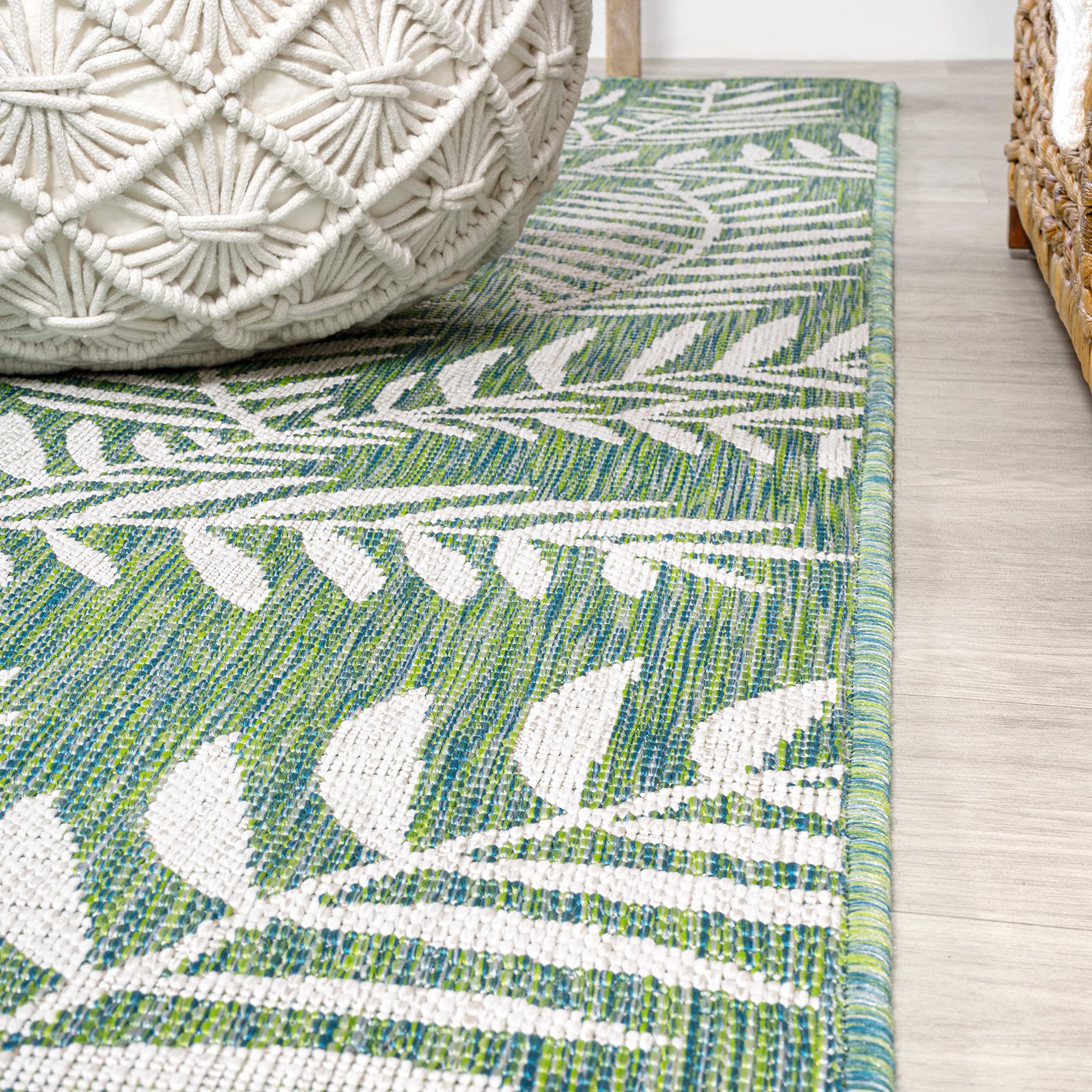 Close-up of palm frond pattern on JONATHAN Y Runner Rug