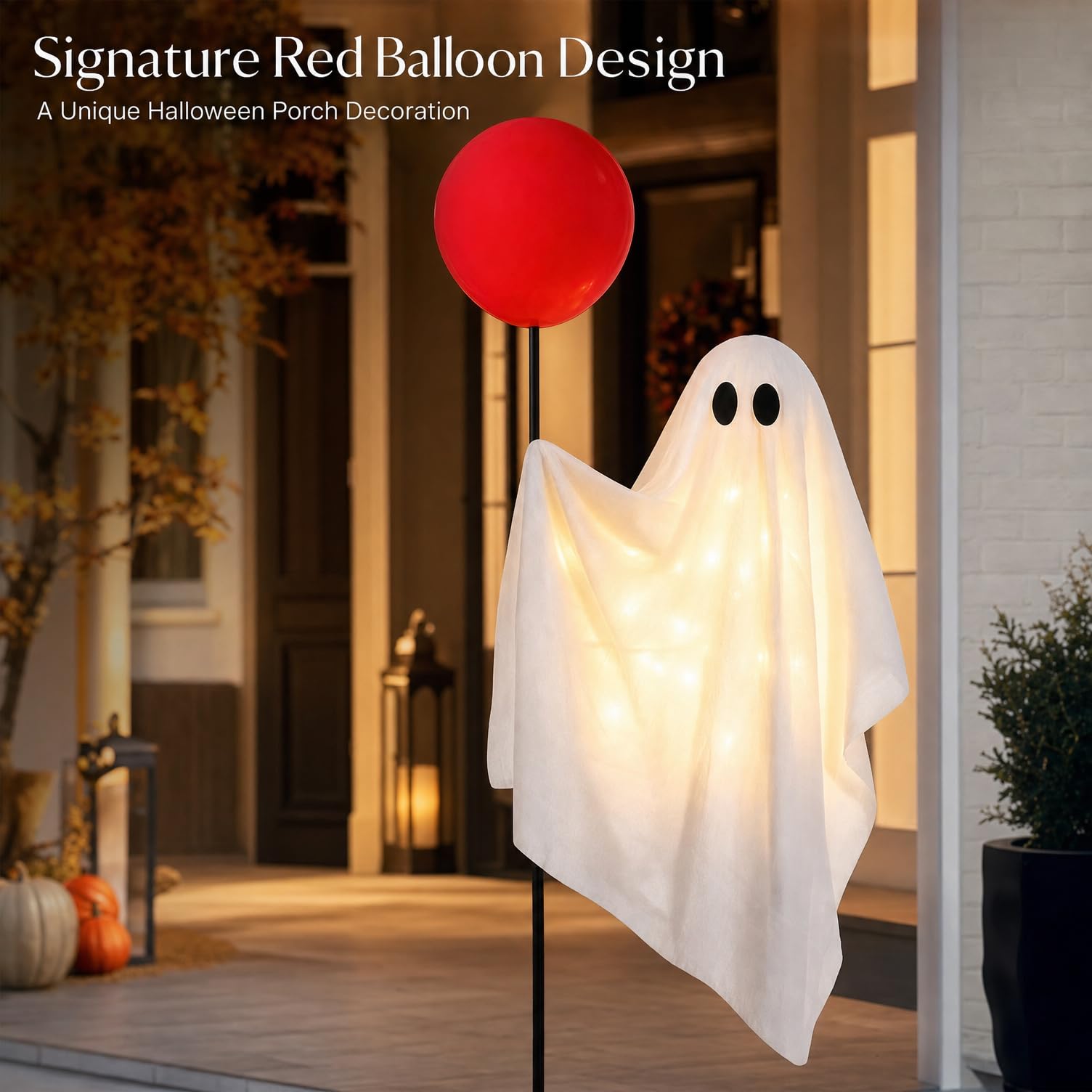 Close-up of Power Your Lawn ghost holding red balloon