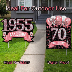 Close-up of rose gold balloons and stars yard sign decorations