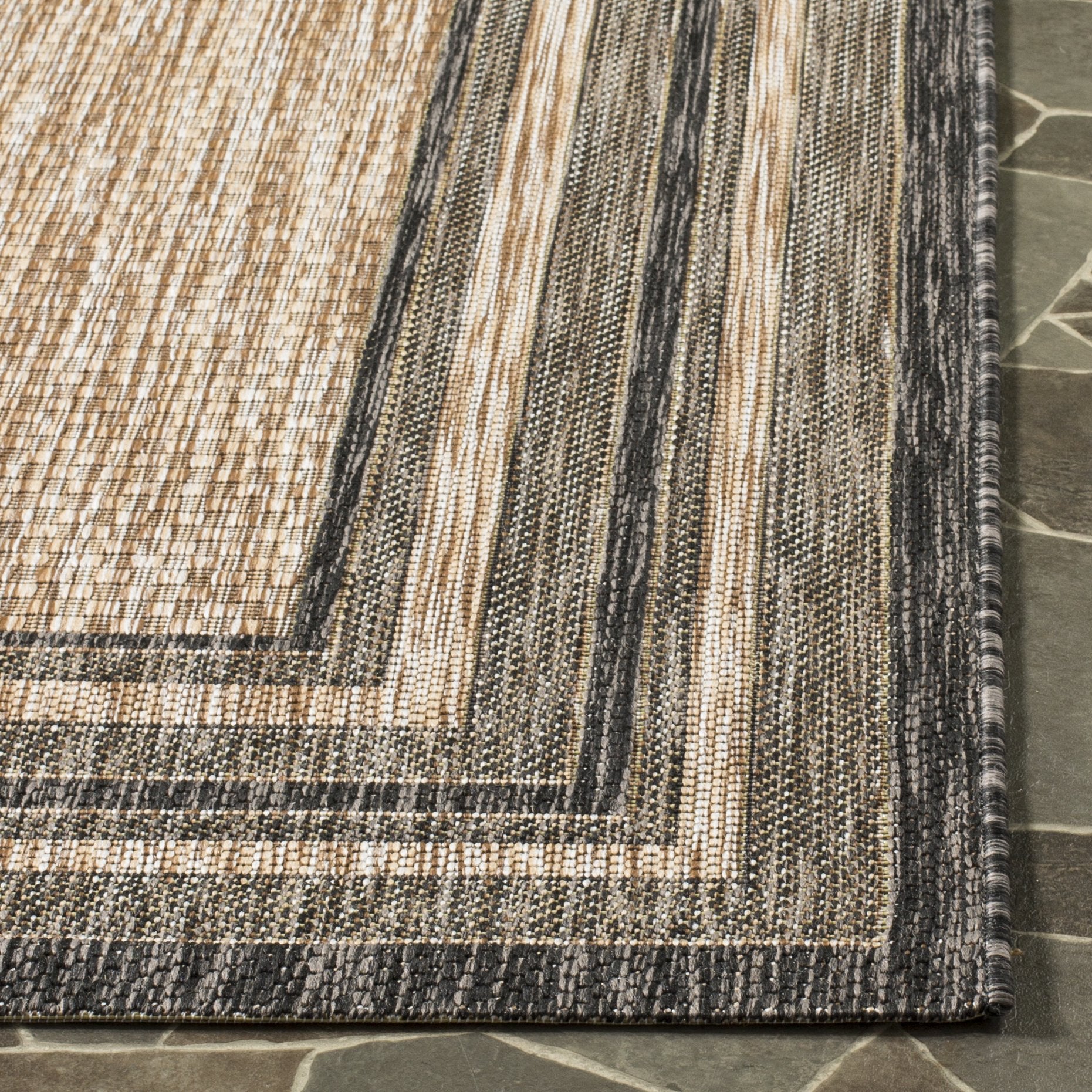 Close-up of SAFAVIEH Courtyard rug texture and material