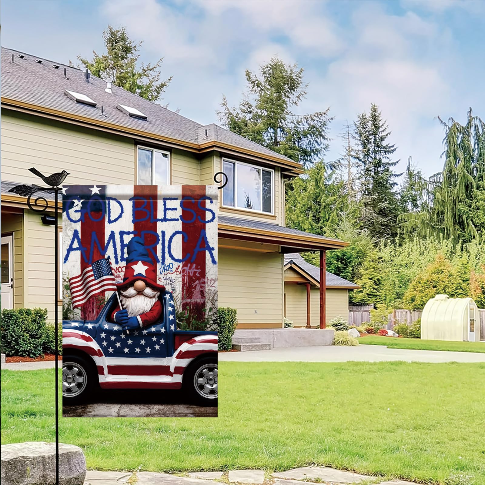 Close-up of Santa Claus holding American flag on garden flag