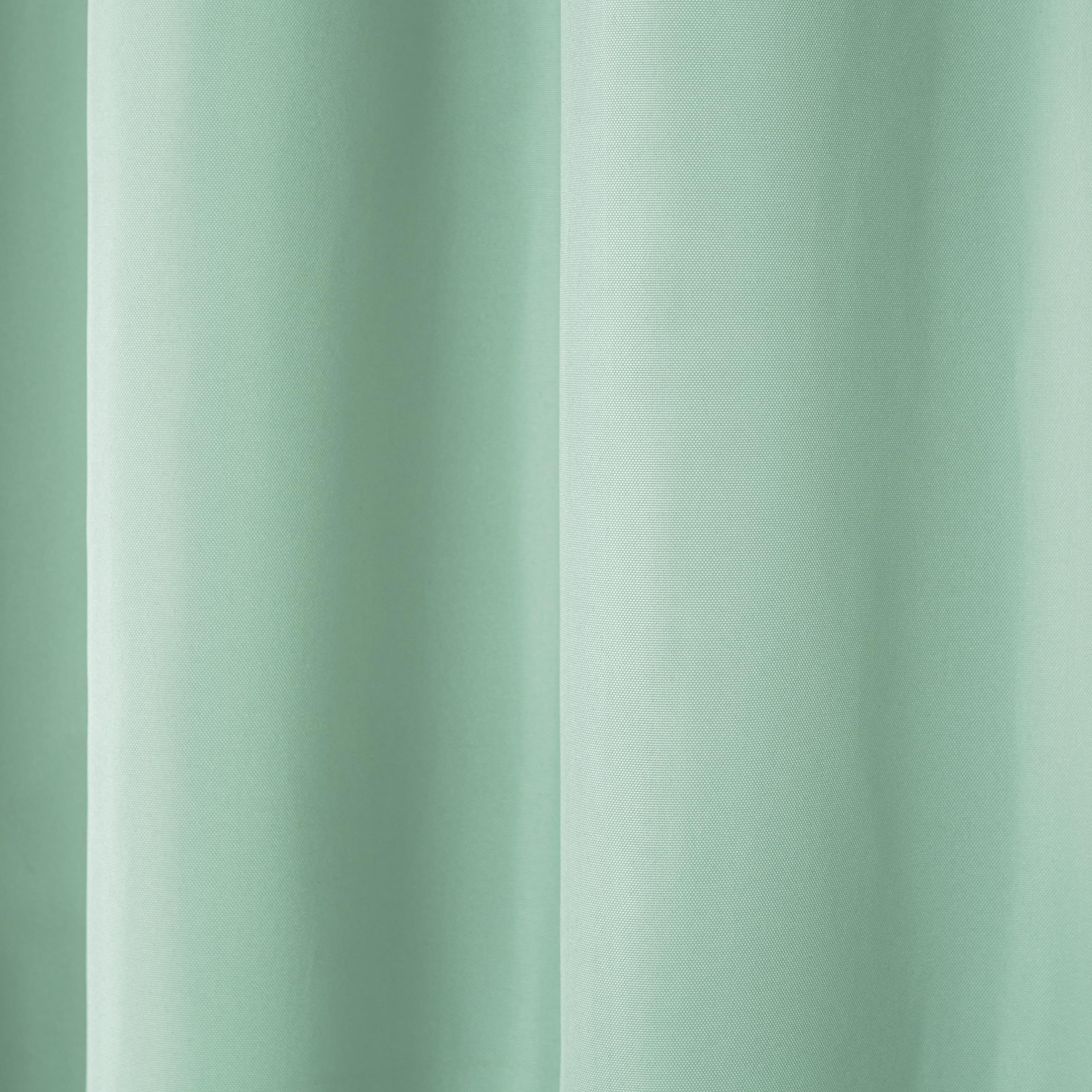Close-up of seafoam fabric texture on curtain panels