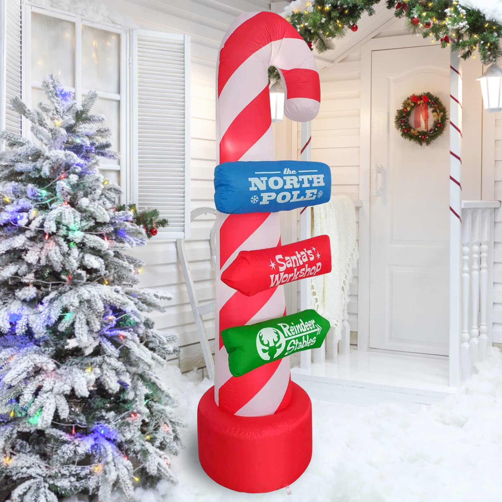 Close-up of SHDEJTG inflatable candy cane with bright LED lights