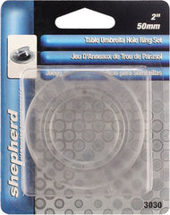Close-up of Shepherd umbrella hole cap on a tabletop