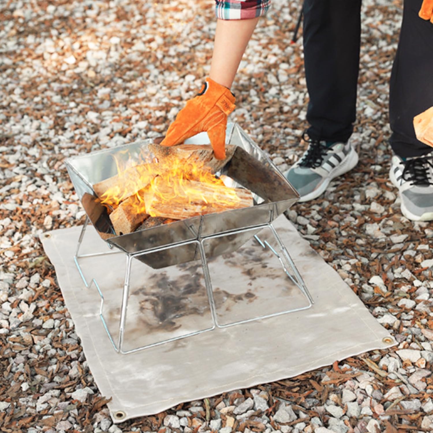 Close-up of SoloWilder Fire Pit Mat edge with fixing holes