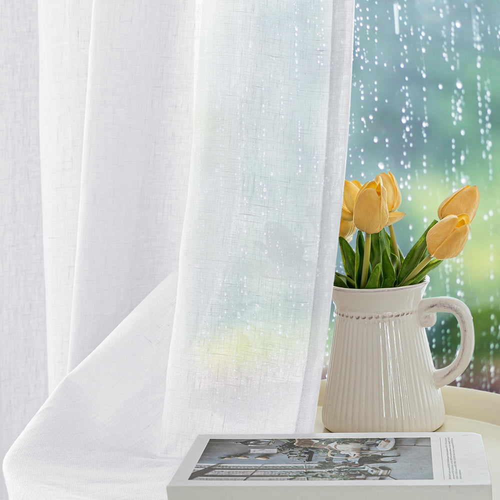 Close-up of stainless steel grommet on HolidayIdeas sheer curtain
