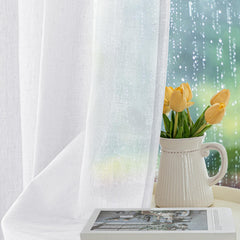 Close-up of stainless steel grommet on HolidayIdeas sheer curtain