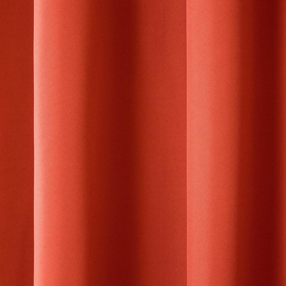 Close-up of stainless steel grommets on curtain panel