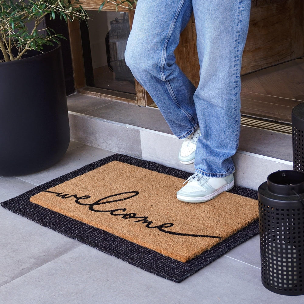 Close-up of the coir texture on THEODORE MAGNUS Welcome Mat