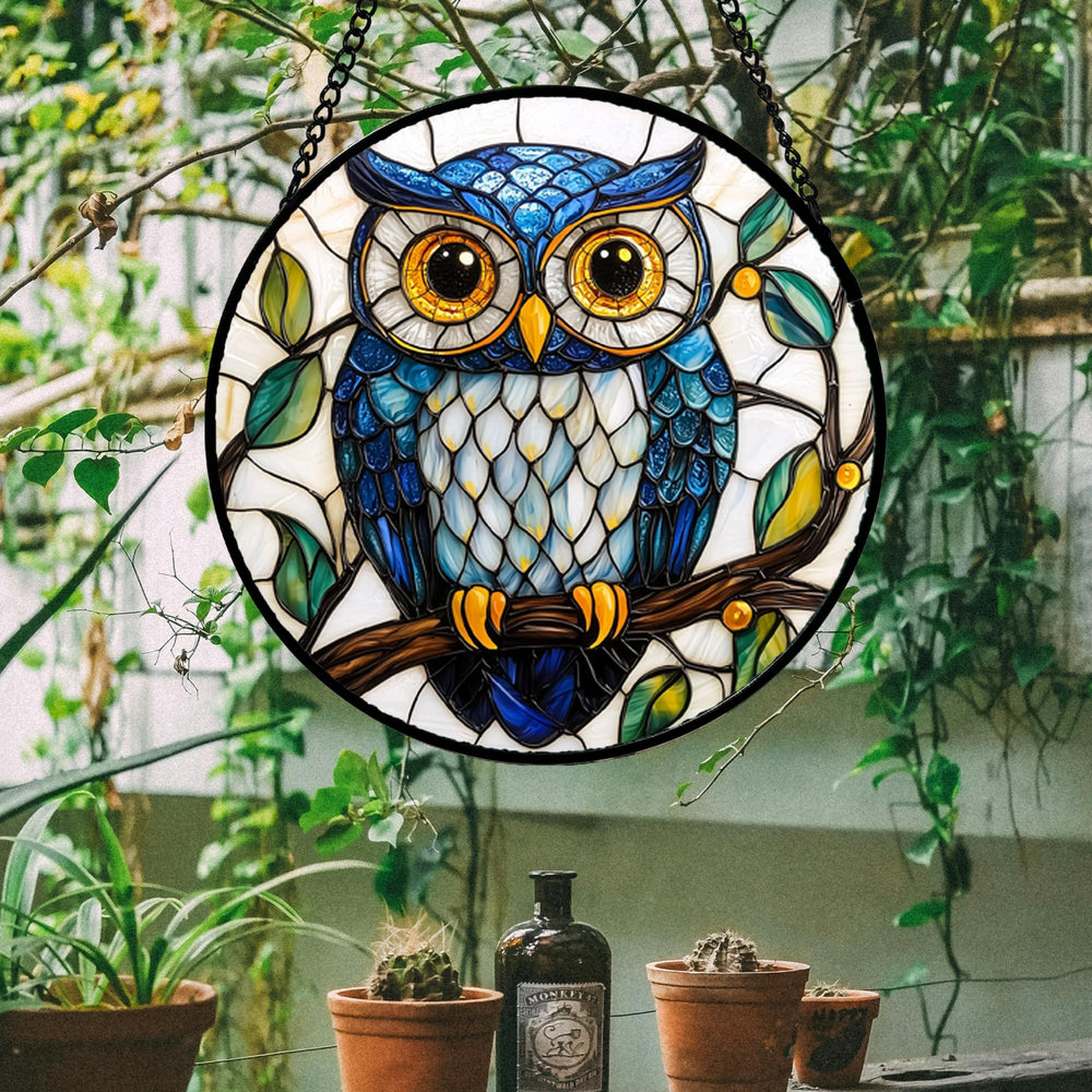 Close-up of the DASTOLL stained glass owl design