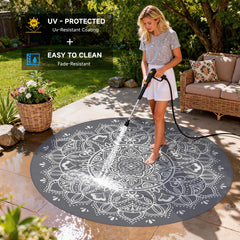 Close-up of the floral grey pattern on Pauwer Outdoor Rug