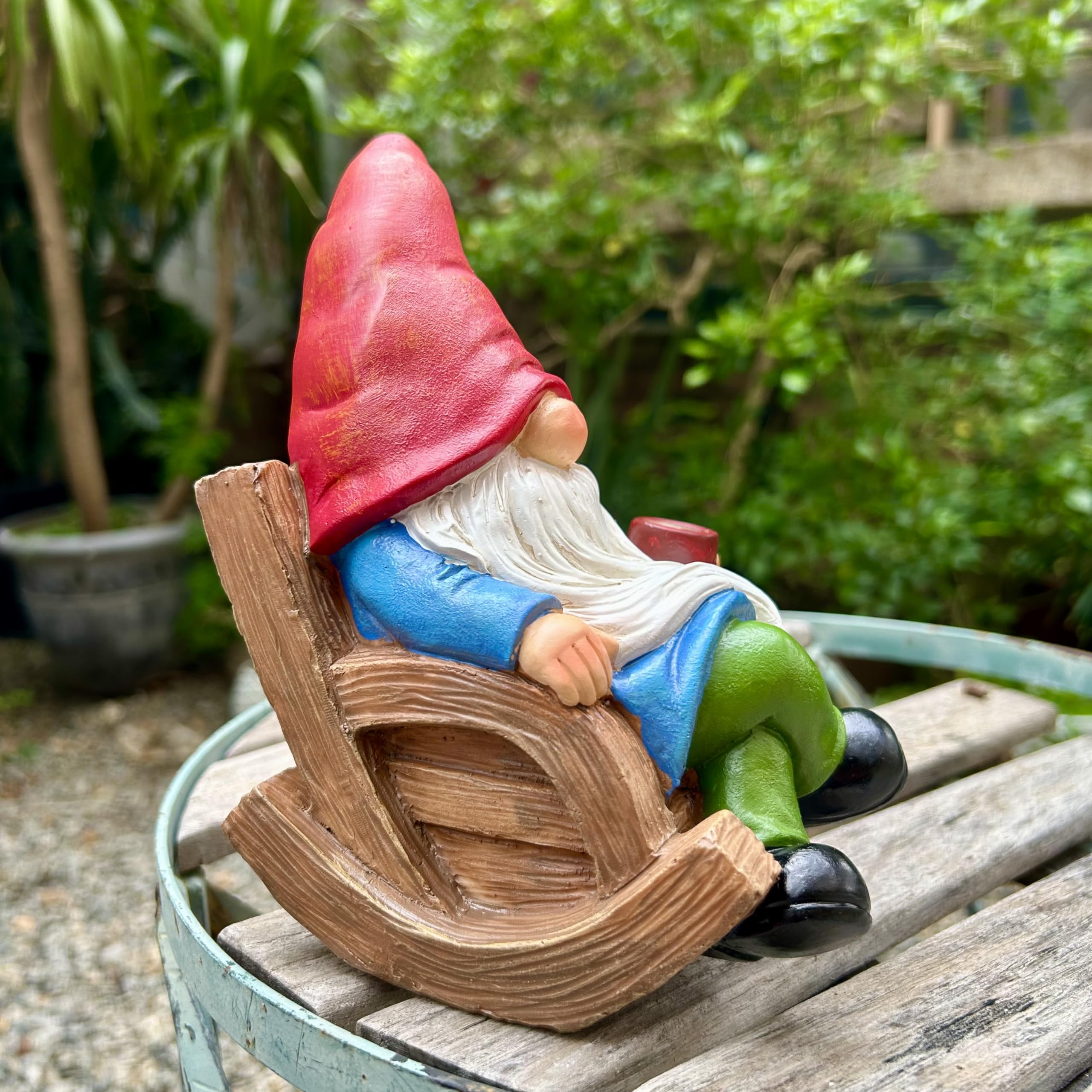 Close-up of the gnome's face and coffee cup