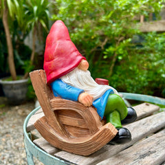 Close-up of the gnome's face and coffee cup