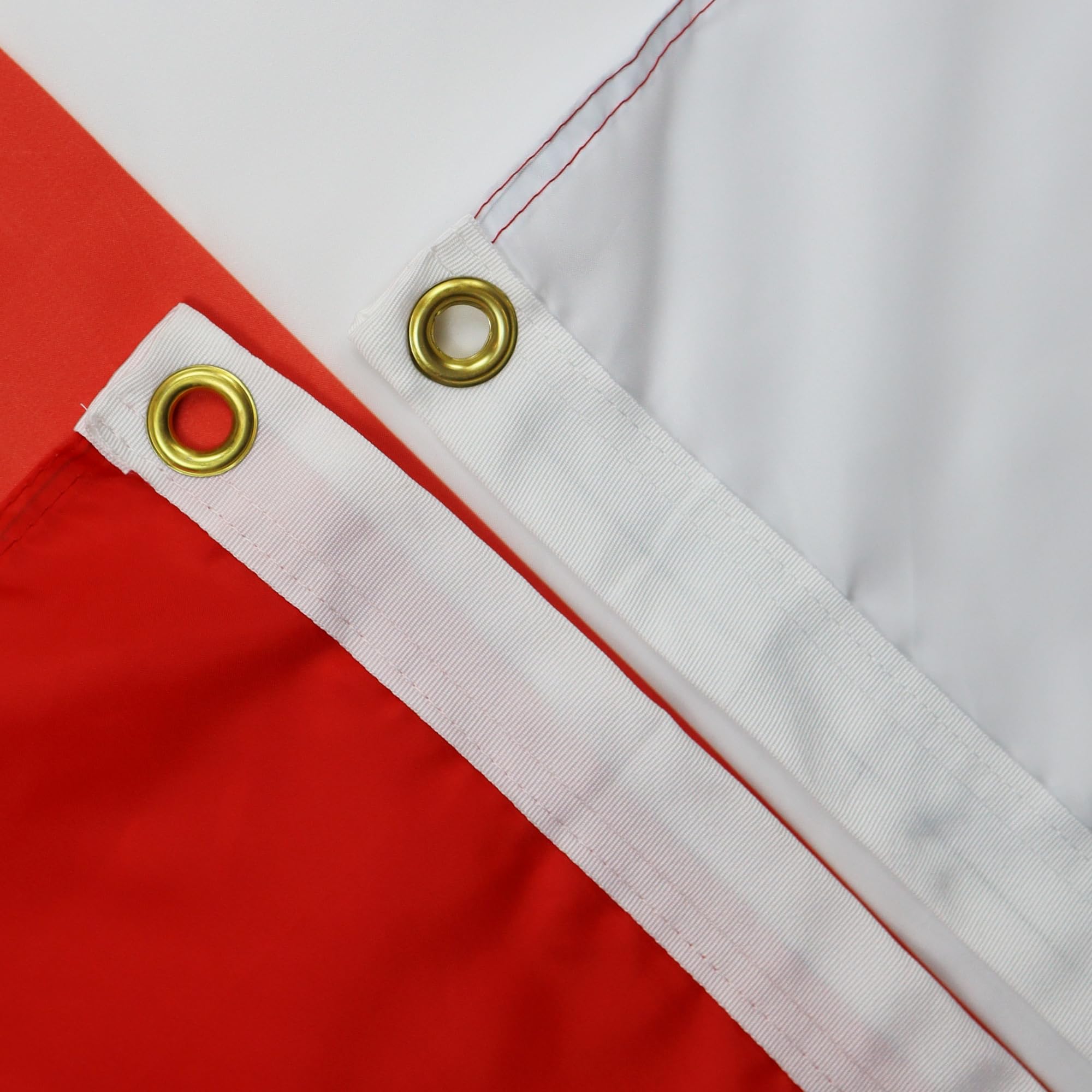 Close-up of the grommets on AZ FLAG Poland with Eagle Flag