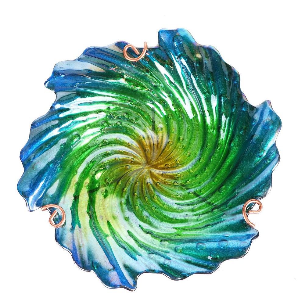 Close-up of the handmade glass bowl of the bird bath
