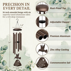 Close-up of the hummingbird design on the wind chimes