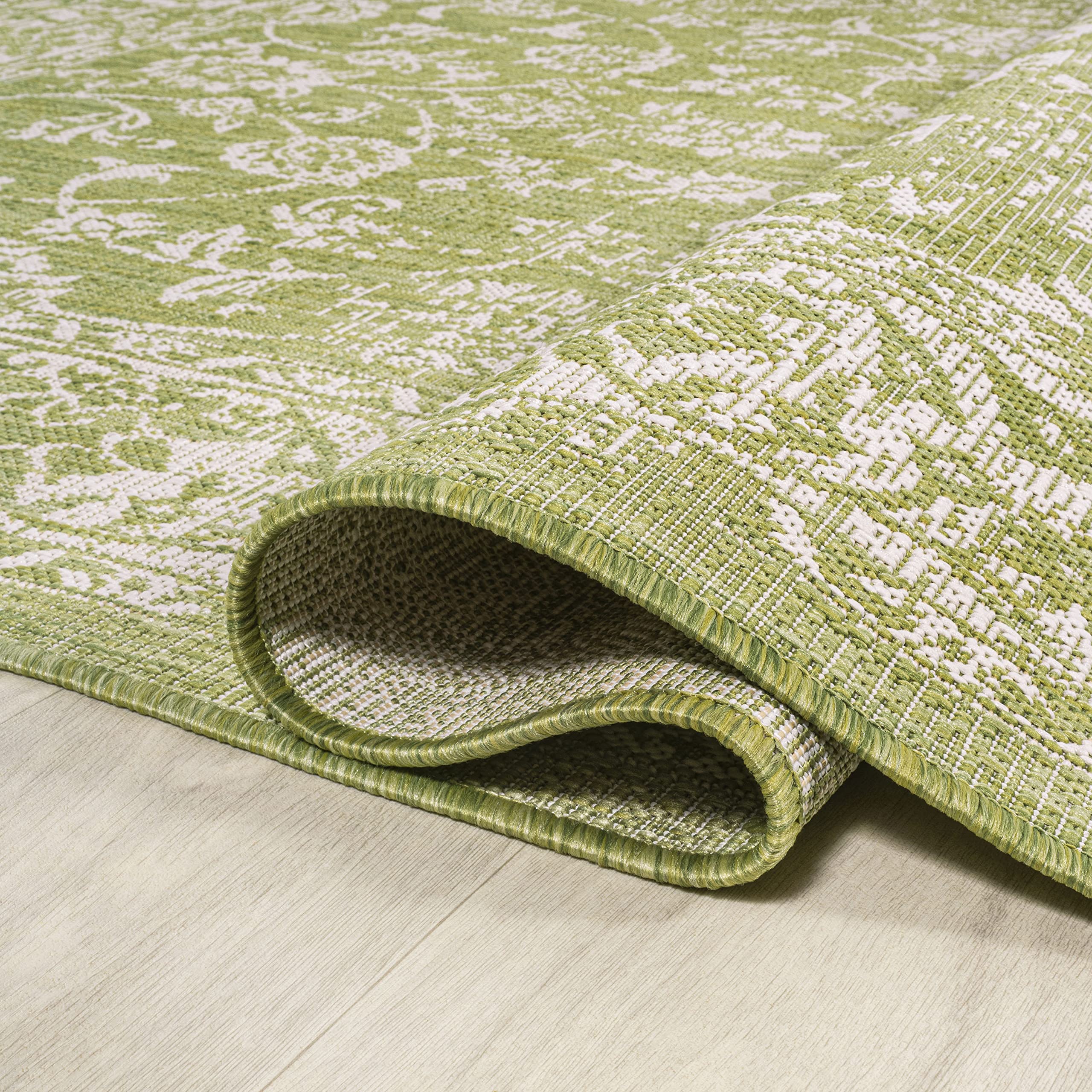 Close-up of the JONATHAN Y Weave Floral Runner Rug showing low-pile construction