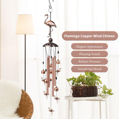 Close-up of the large flamingo on Nowpis wind chimes