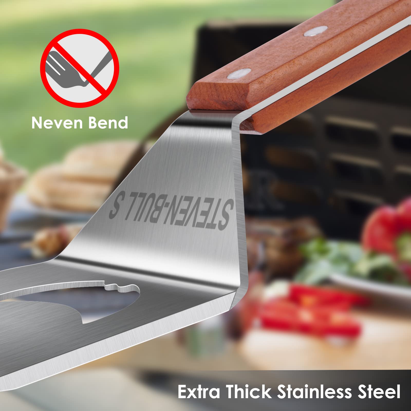 Close-up of the metal head of the grill spatula