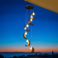 Close-up of the moon design on Tryme Solar Wind Chimes