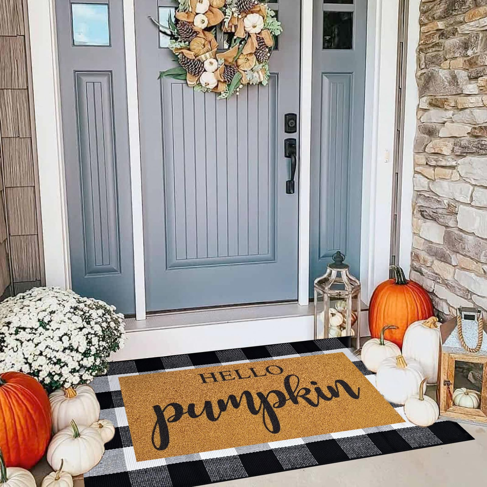 Close-up of the pumpkin welcome doormat in black and white