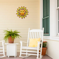 Close-up of the sun face on Daogtc Metal Wall Decor