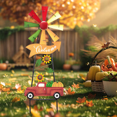 Close-up of the truck filled with pumpkins on the wind spinner