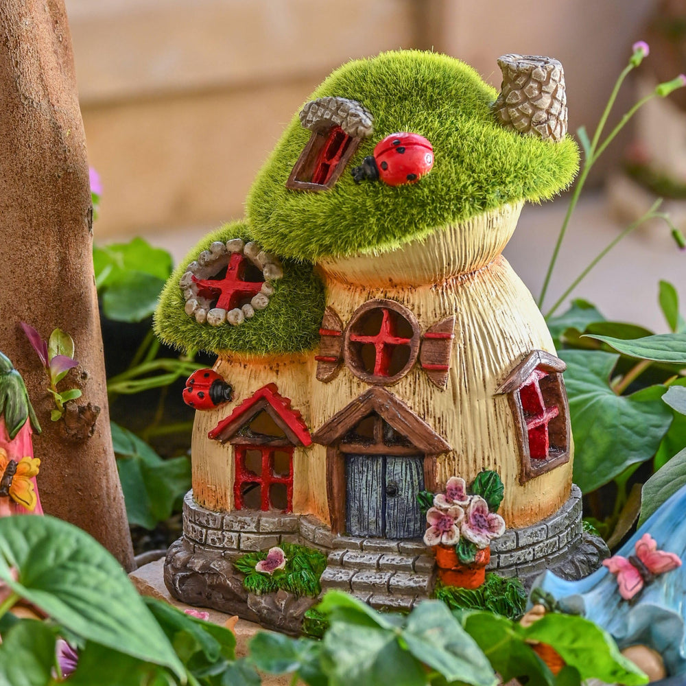 Close-up of the vibrant green mossy roof on the mushroom statue