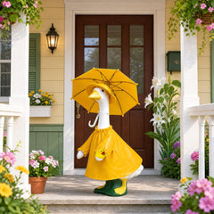 Close-up of the yellow raincoat on a goose statue