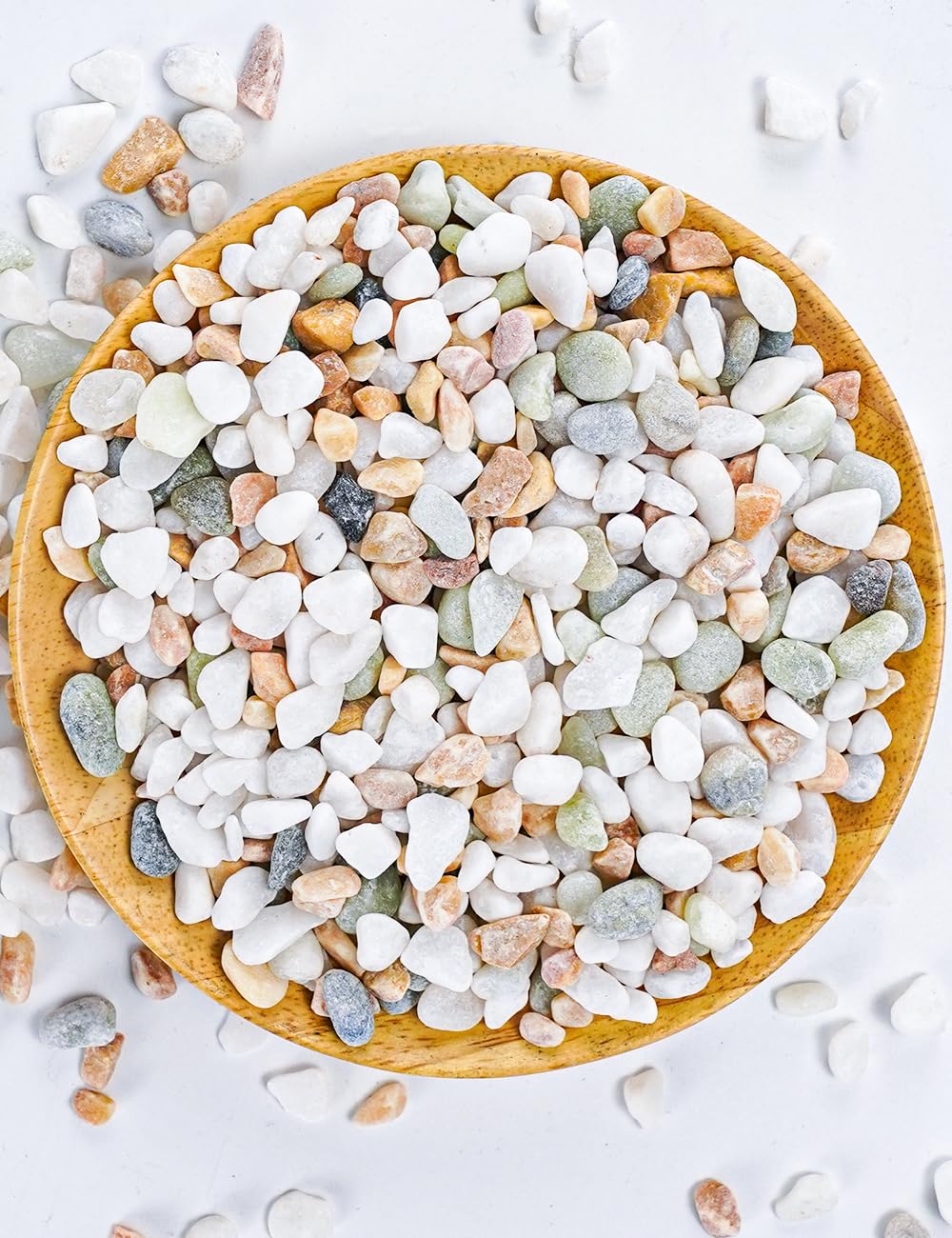 Close-up of TOYPOPOR decorative pebbles showing pastel colours