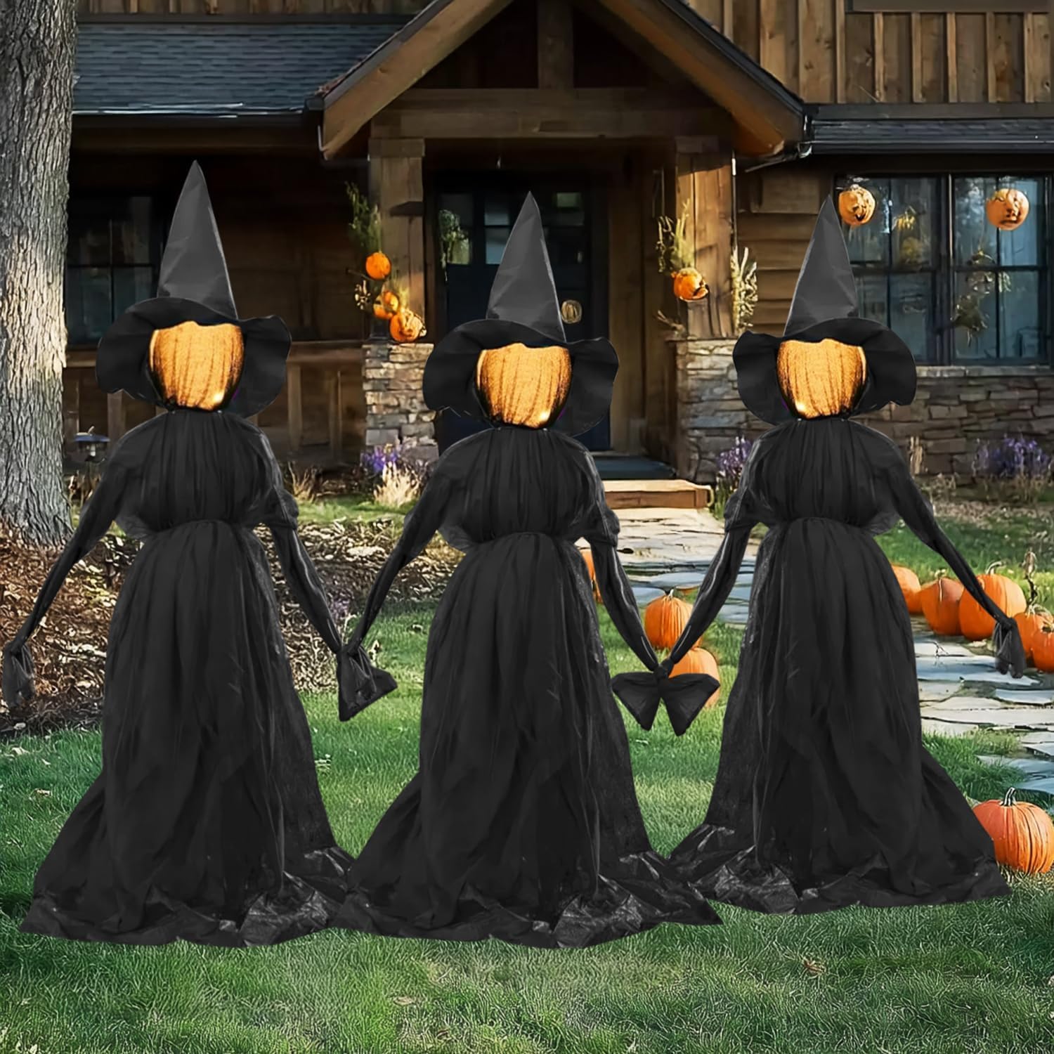 Close-up of TW SHINE witch decorations with glowing heads