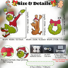Close-up of ULTHOOL Christmas fence peeker signs showing their size