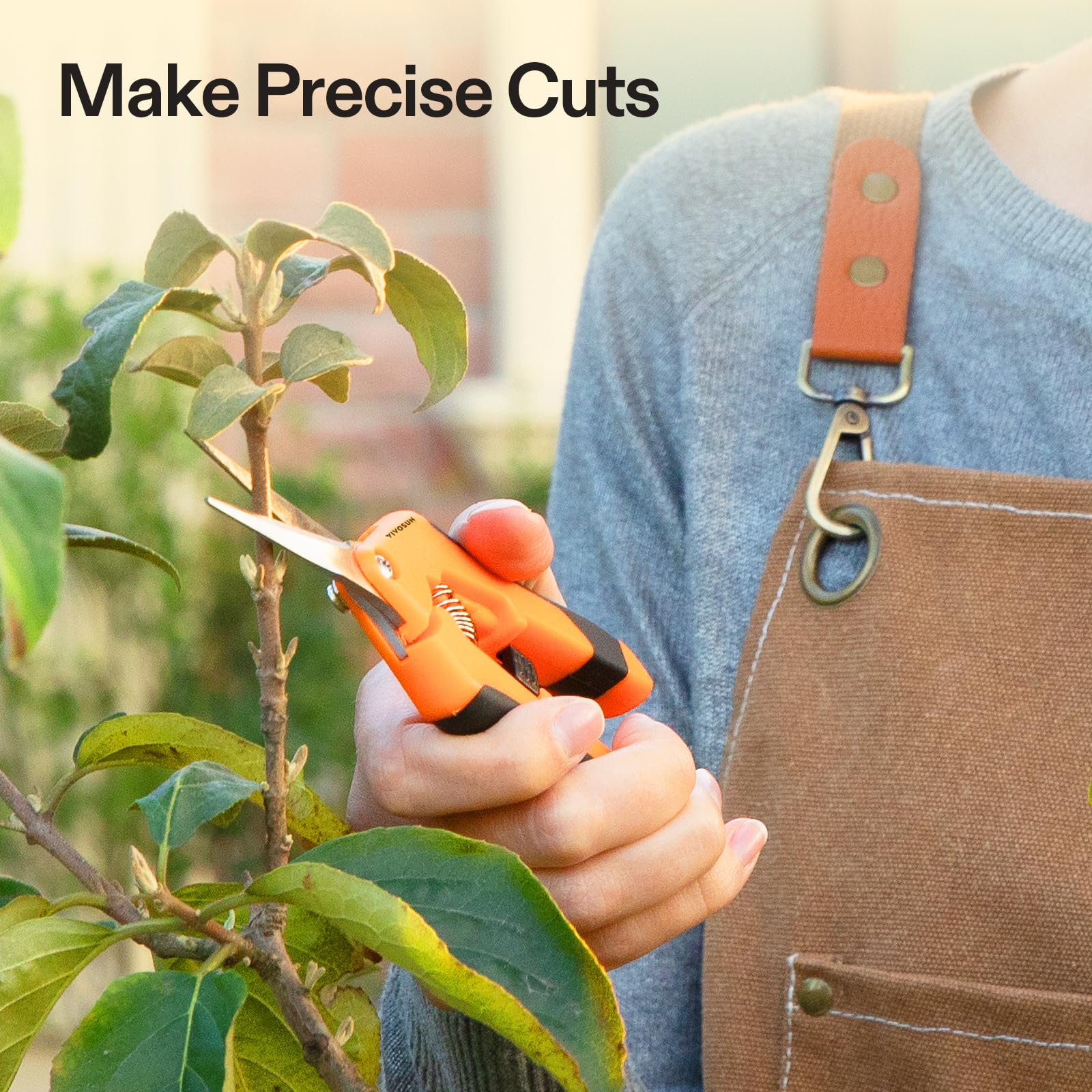 Close-up of VIVOSUN Garden Scissors blades cutting a stem