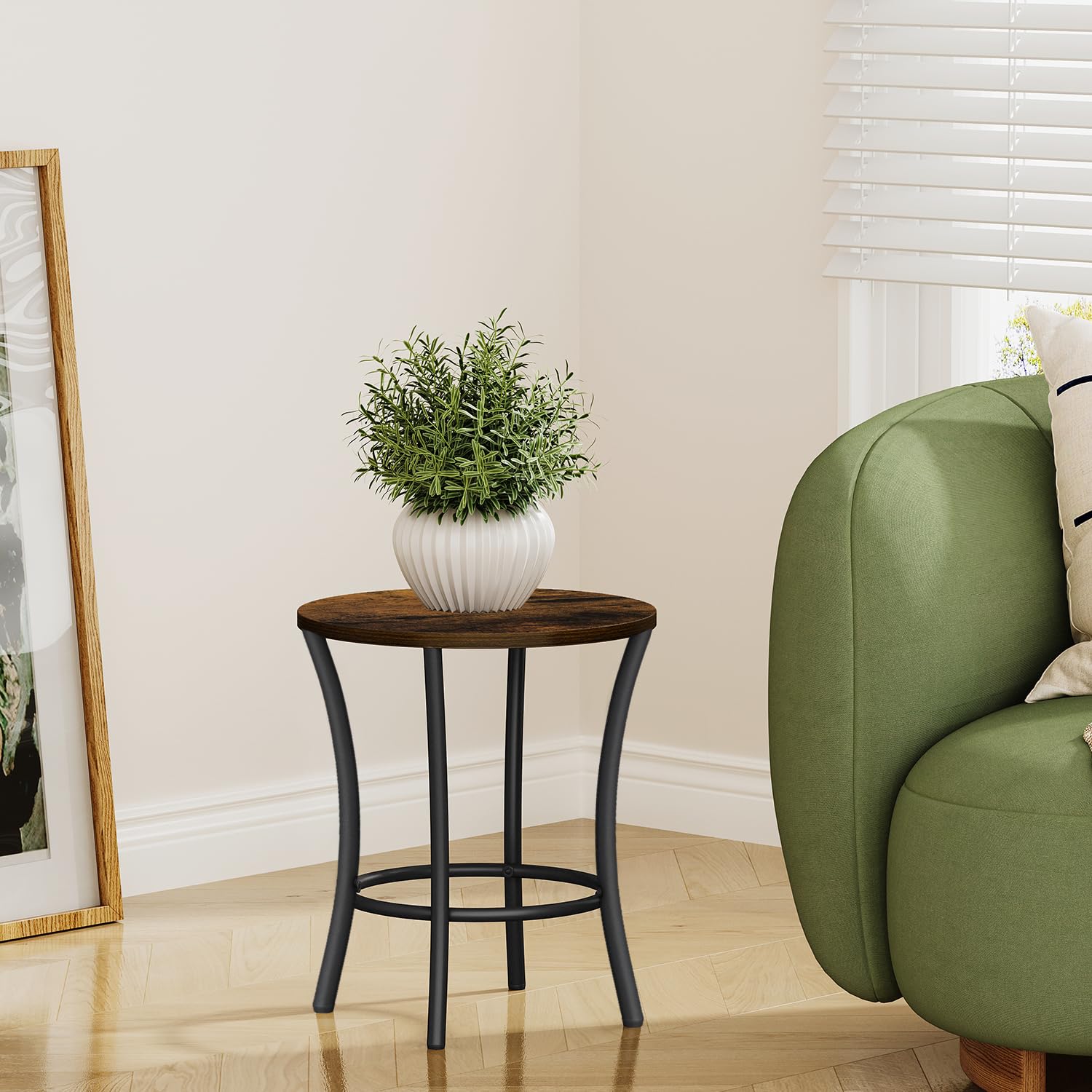 Close-up of YINMIT Plant Stand's curved iron pipe design