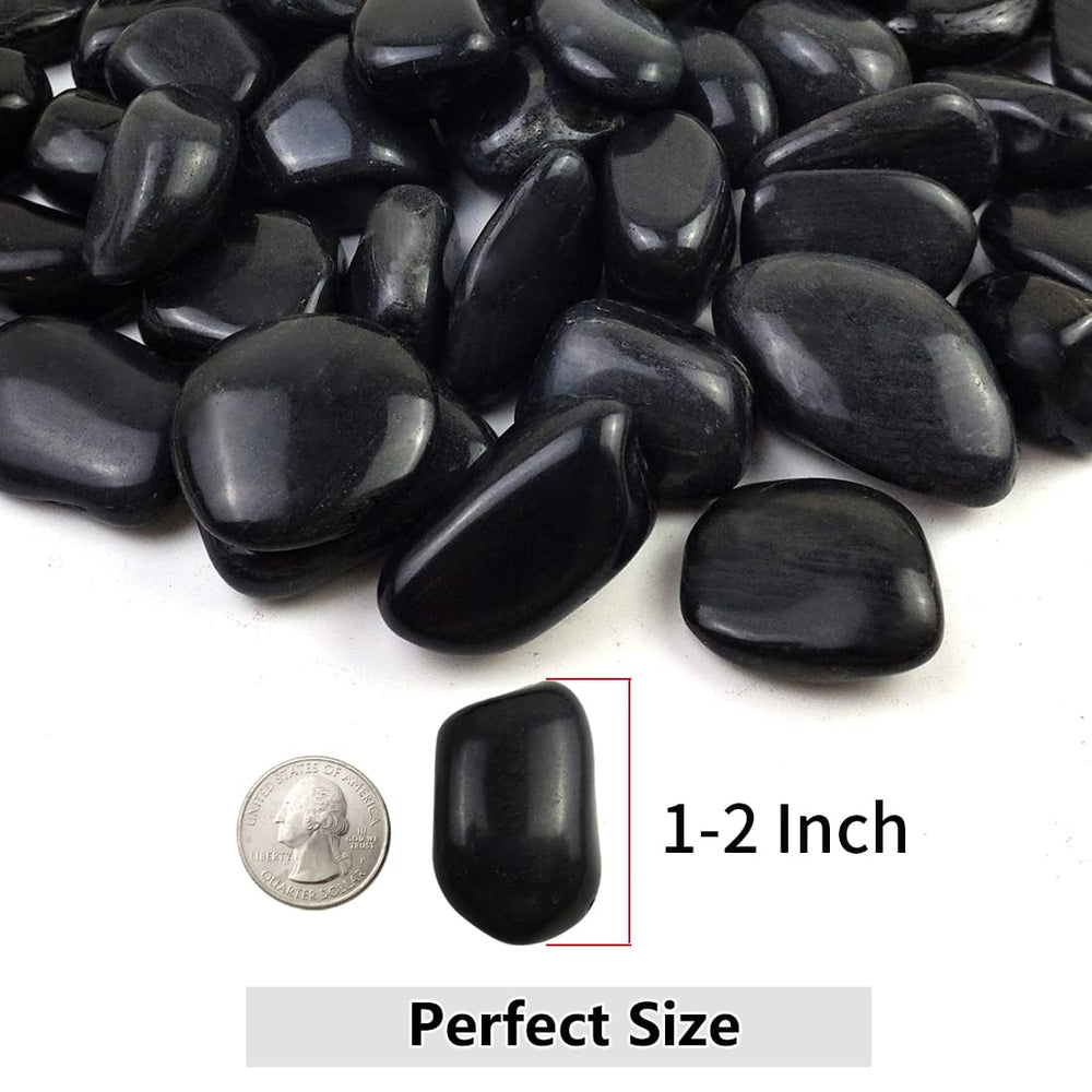 Close-up of YISZM black pebbles showing smooth texture